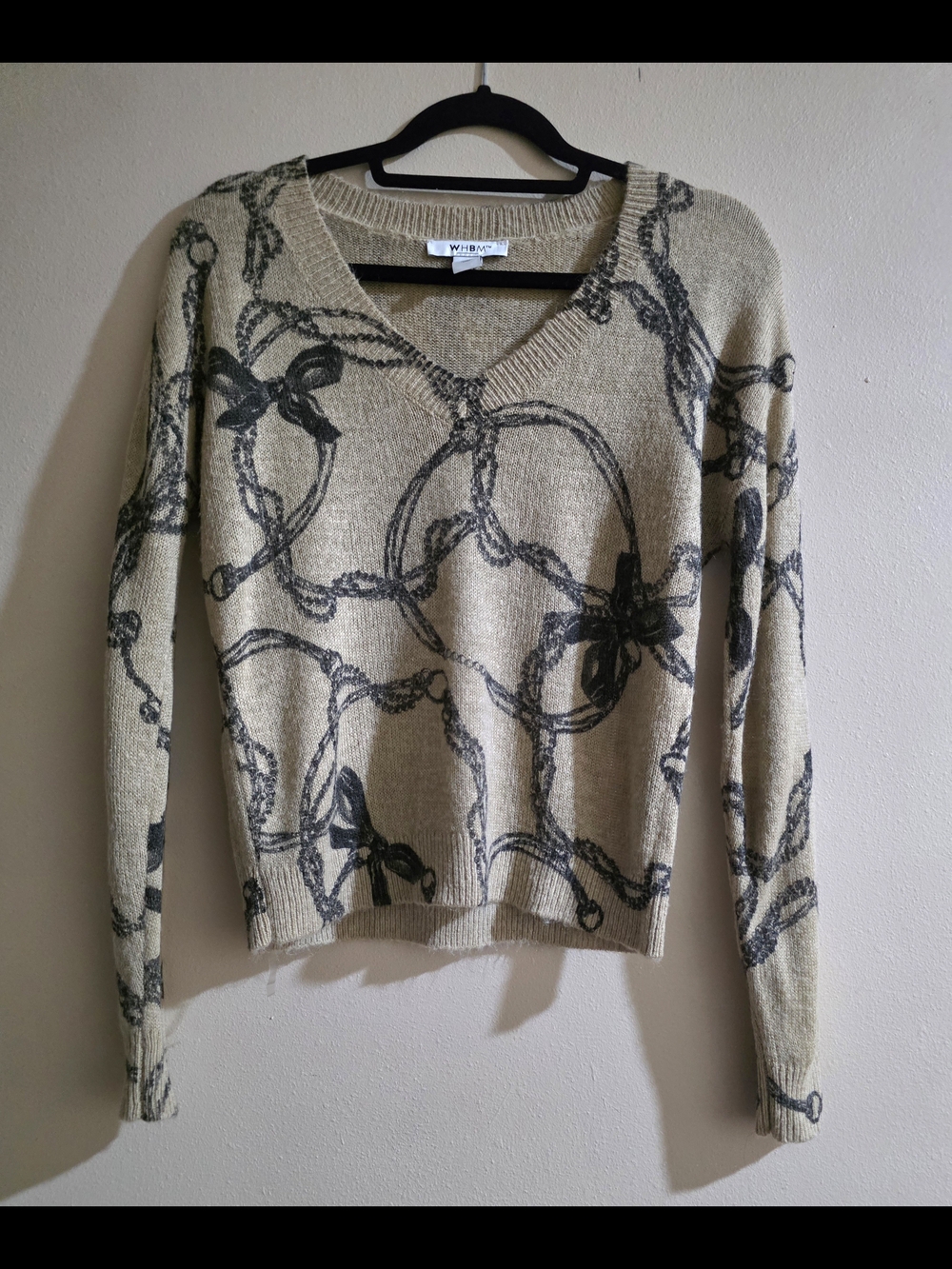 White House Black Market Cream V-Neck Sweater with Black Chain & Bow Print